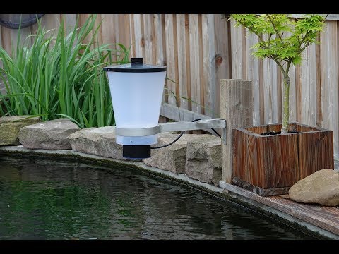 Linn Futterautomat für Teiche und Koiteiche. Zur Fütterung von Fischen und Koi Fischen. Automatische Fütterung in kleinen Portionen. Futterautomat mit Motor und Steuerung. Mehrere Fütterungen pro Tag einstellbar. Qualität aus Deutschland!